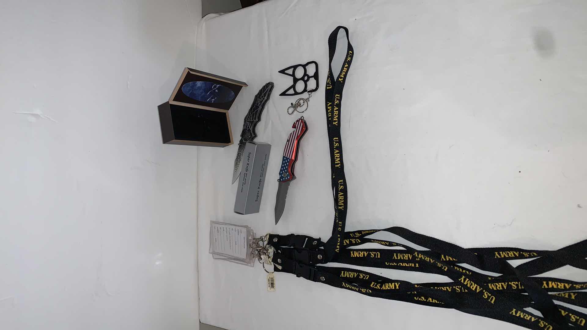 Photo 1 of SET OF U.S. ARMY LANYARDS WITH SUPER KNIFE, SPIDER-MAN KNIFE, AND CAT EYE MELEE PROTECTION