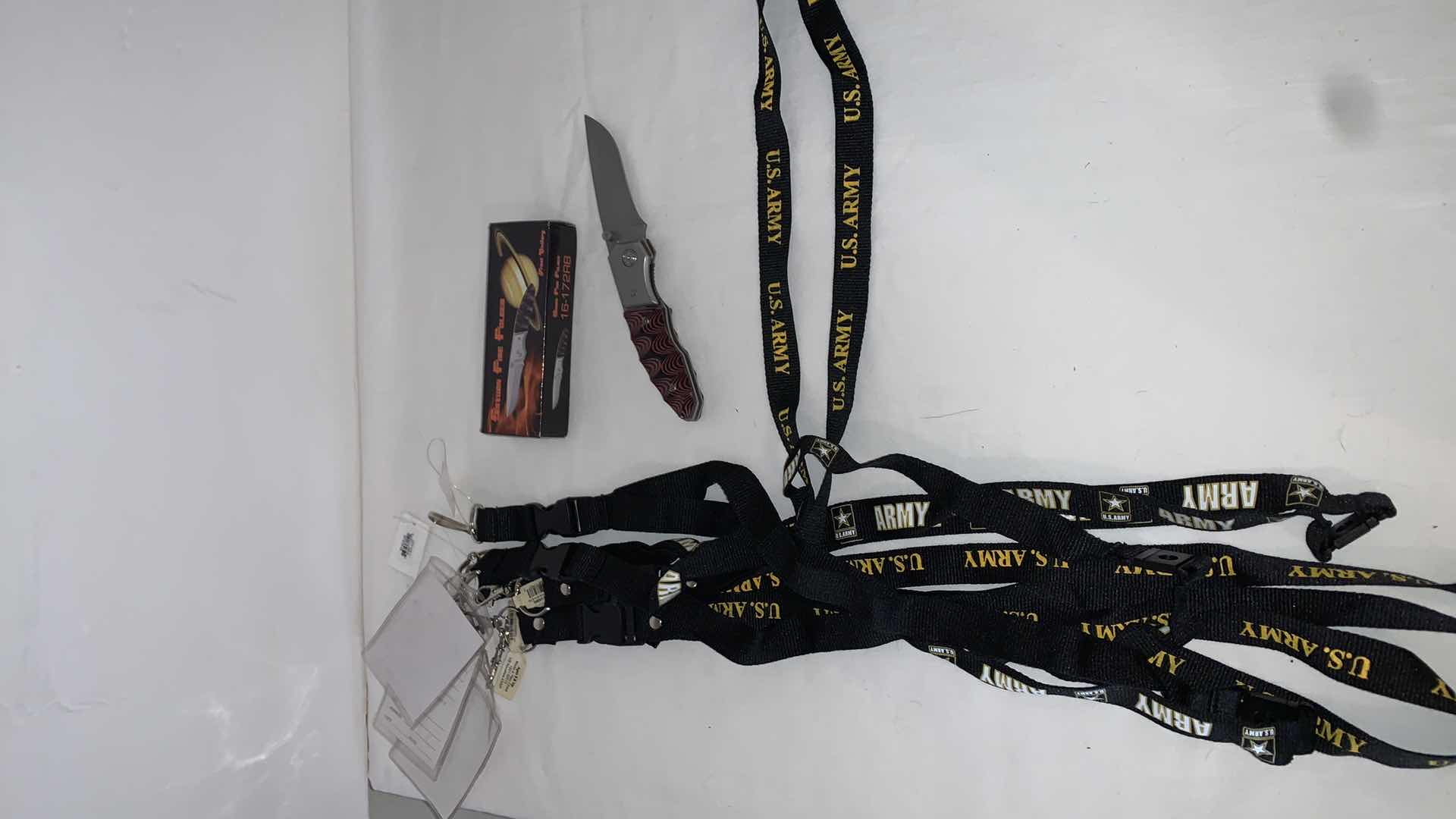 Photo 1 of SET OF U.S. ARMY LANYARDS WITH SATURN FIRE FOLDER KNIFE