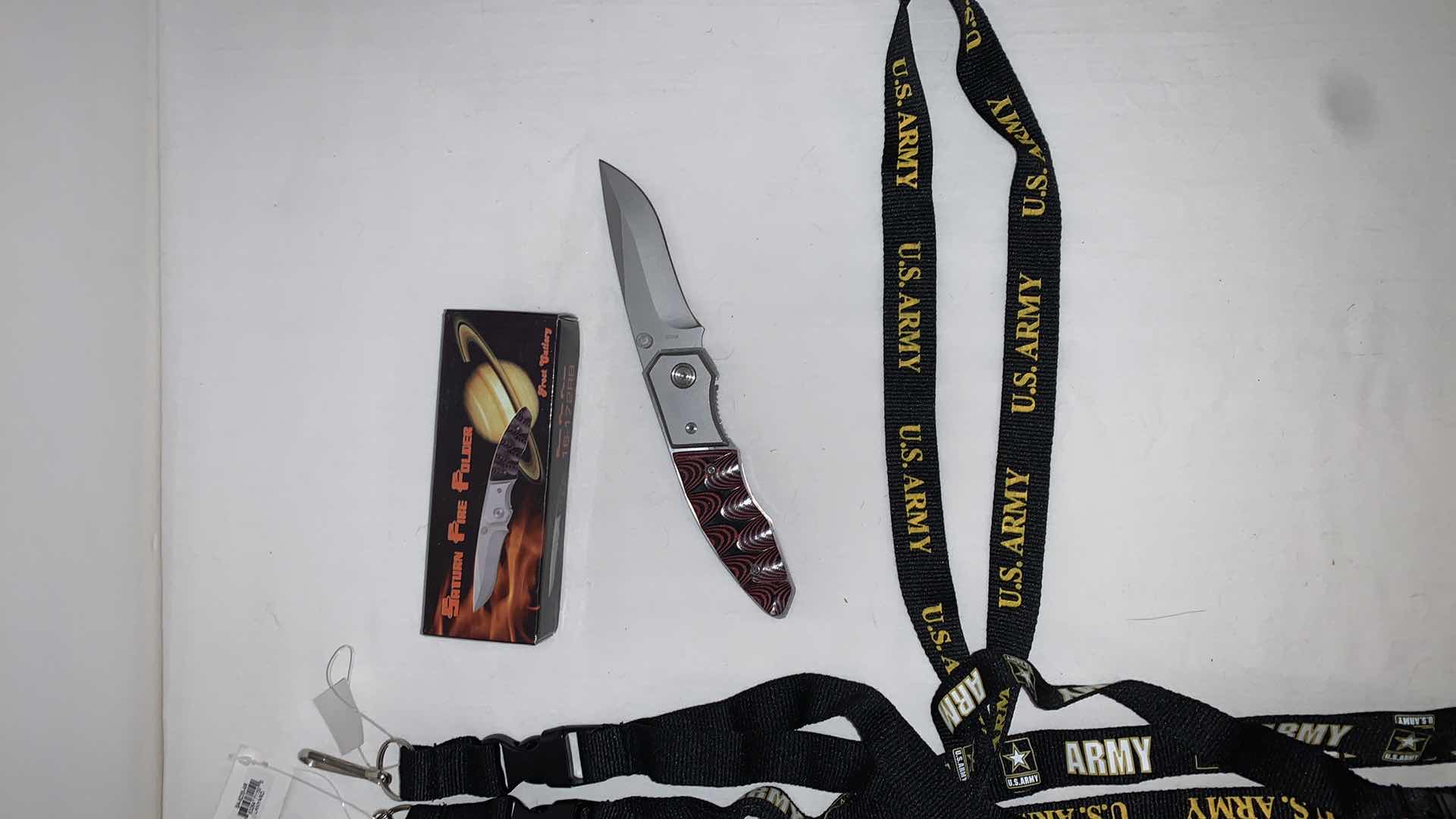 Photo 3 of SET OF U.S. ARMY LANYARDS WITH SATURN FIRE FOLDER KNIFE