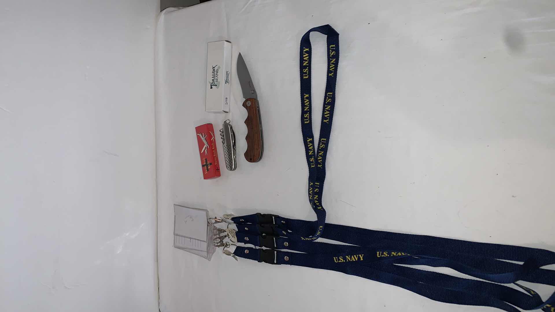 Photo 1 of SET OF U.S. NAVY LANYARDS WITH SWISS STYLE KNIFE AND TOMAHAWK BRAND KNIFE