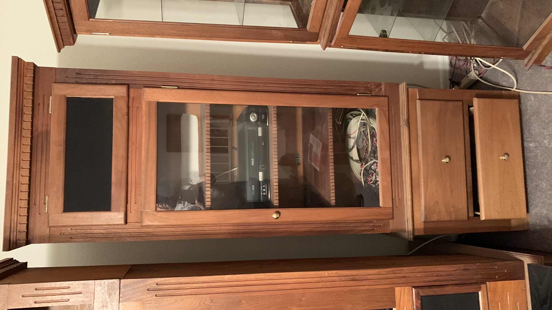 Photo 1 of DISPLAY CABINET 24” X 17” H 78” VHS PLAYER INCLUDED