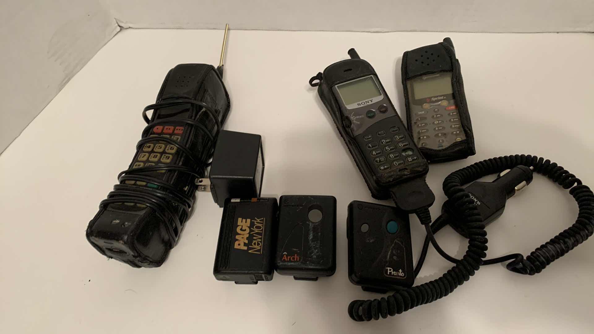 Photo 1 of VINTAGE CELL PHONES AND BEEPERS