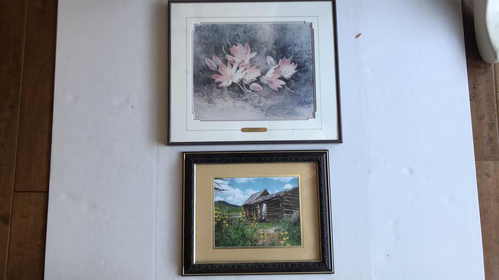 Photo 1 of FRAMED JEAN HALVERSON PRINT, 20” W x 17”H ; AND FRAMED PHOTO OF LOG CABIN, 16 1/2” W x 13 1/2”H