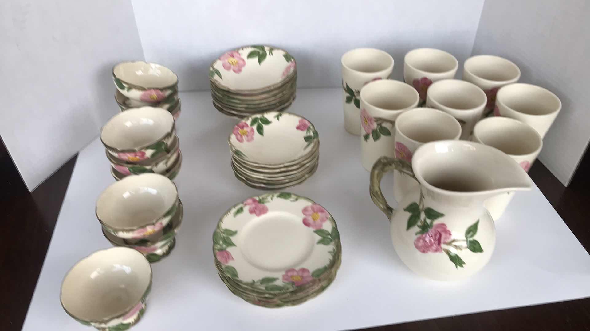 Photo 1 of FRANCISCAN DESIGN, 8 WATER CUPS, WATER PITCHER, 9 SMALL DESSERT BOWLS, 7 MEDIUM DESSERT BOWLS, 7 LARGER DESSERT BOWLS, AND 5 SAUCERS FOR ALL DESSERT BOWLS