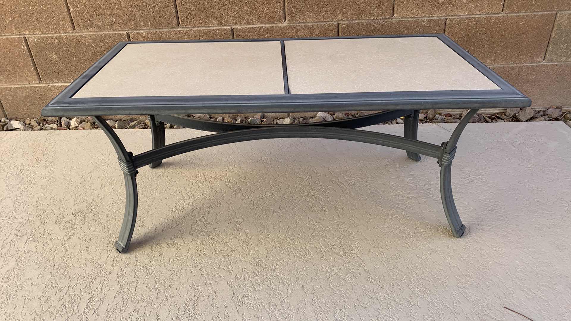 Photo 1 of STONE AND METAL PATIO TABLE 40” X 20” H 17”