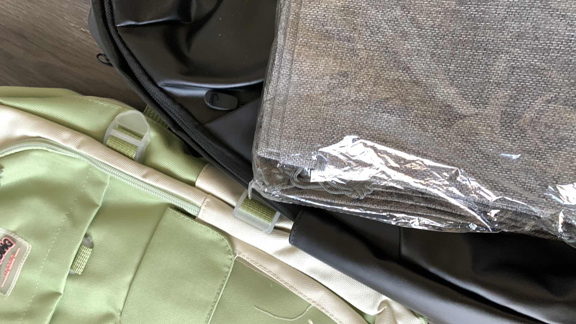 Photo 1 of BACKPACKS AND BAGS