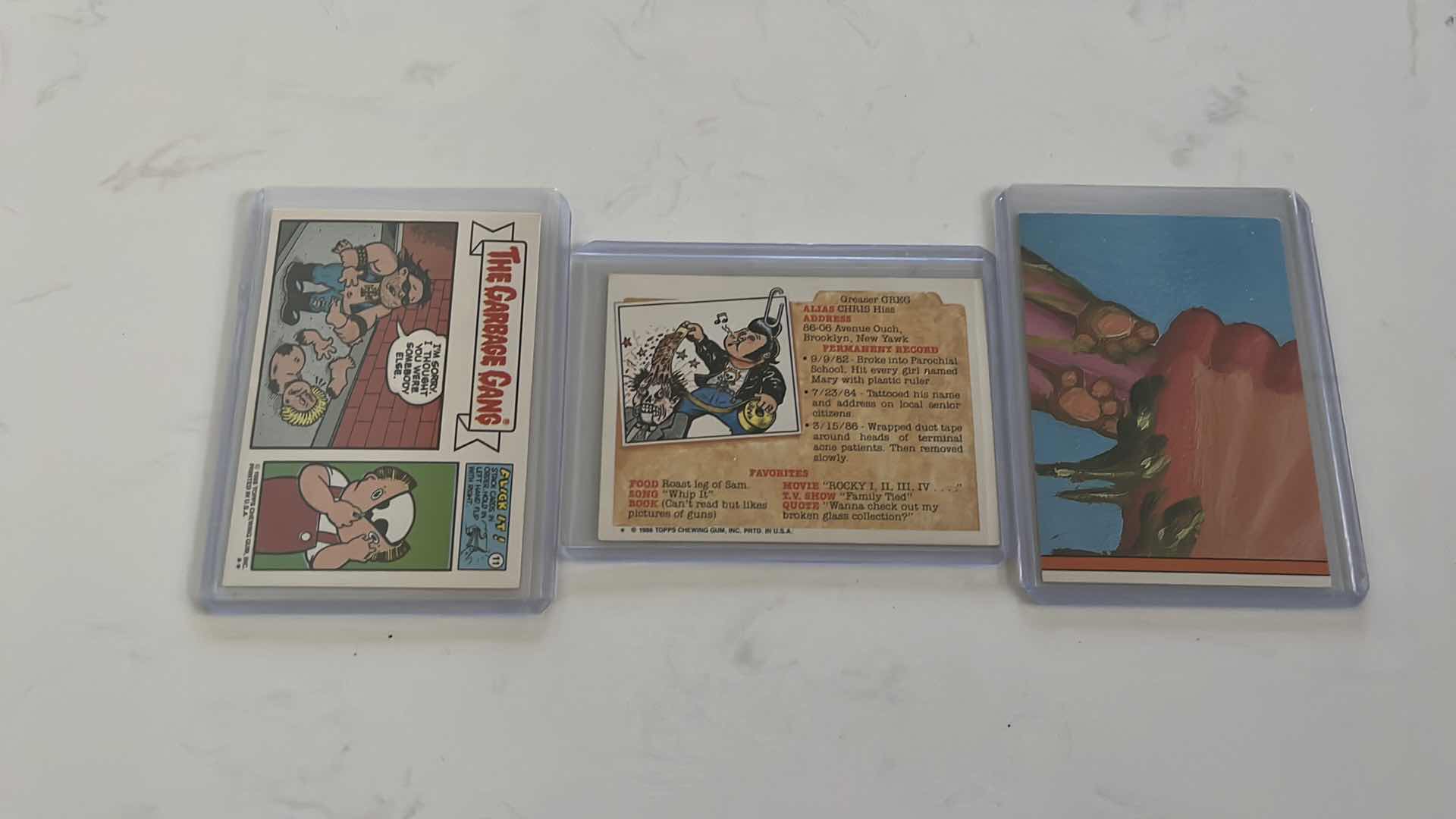 Photo 2 of Assorted garbage pail kids collectible sticker cards