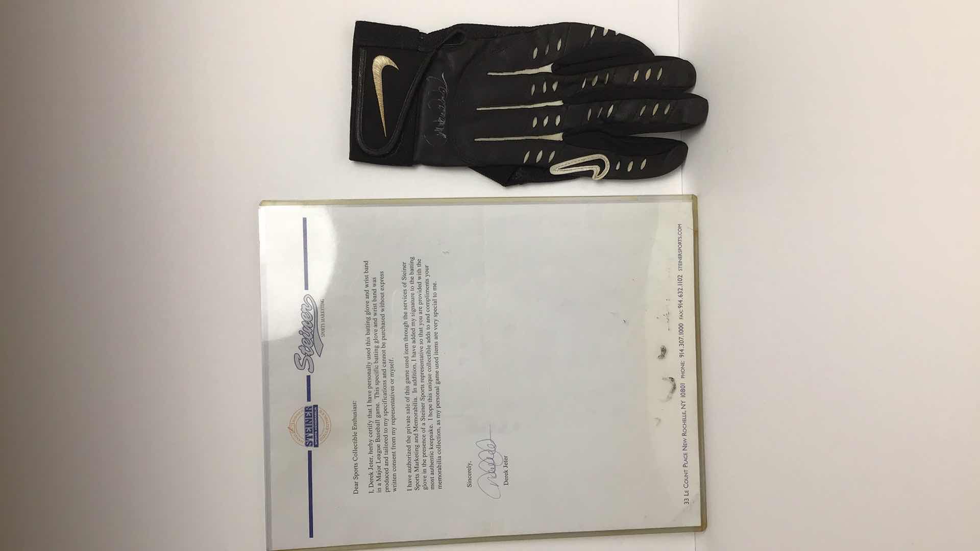 Photo 1 of DEREK JETER SIGNED GAME GLOVE STEINER SPORTS MEMORABILIA AUTHENTIC W LETTER*