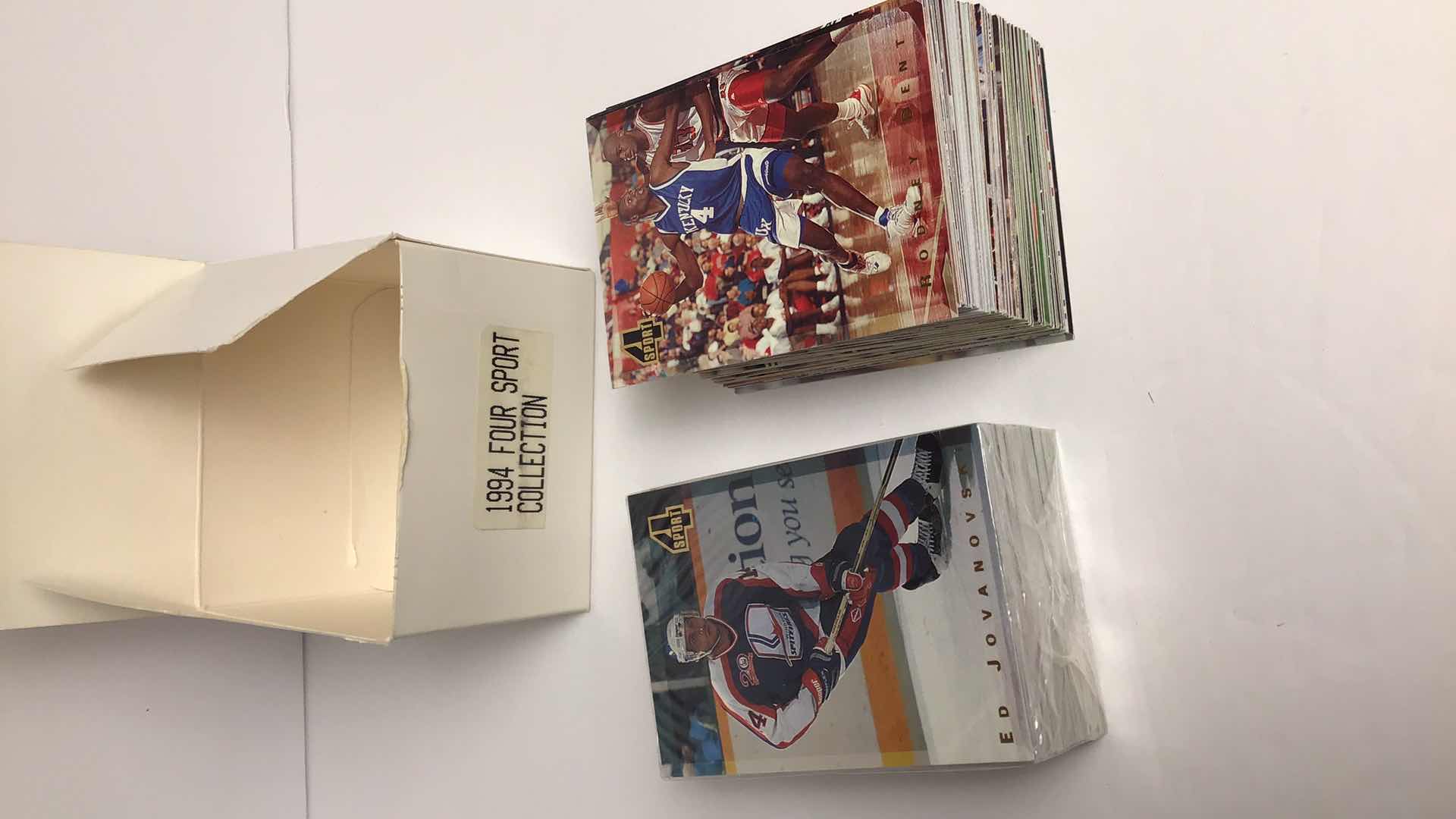 Photo 1 of $75 1994 FOUR SPORT COLLECTION MLB, NFL, NBA, NHL APPROX 200 CARDS (100 SEALED)*