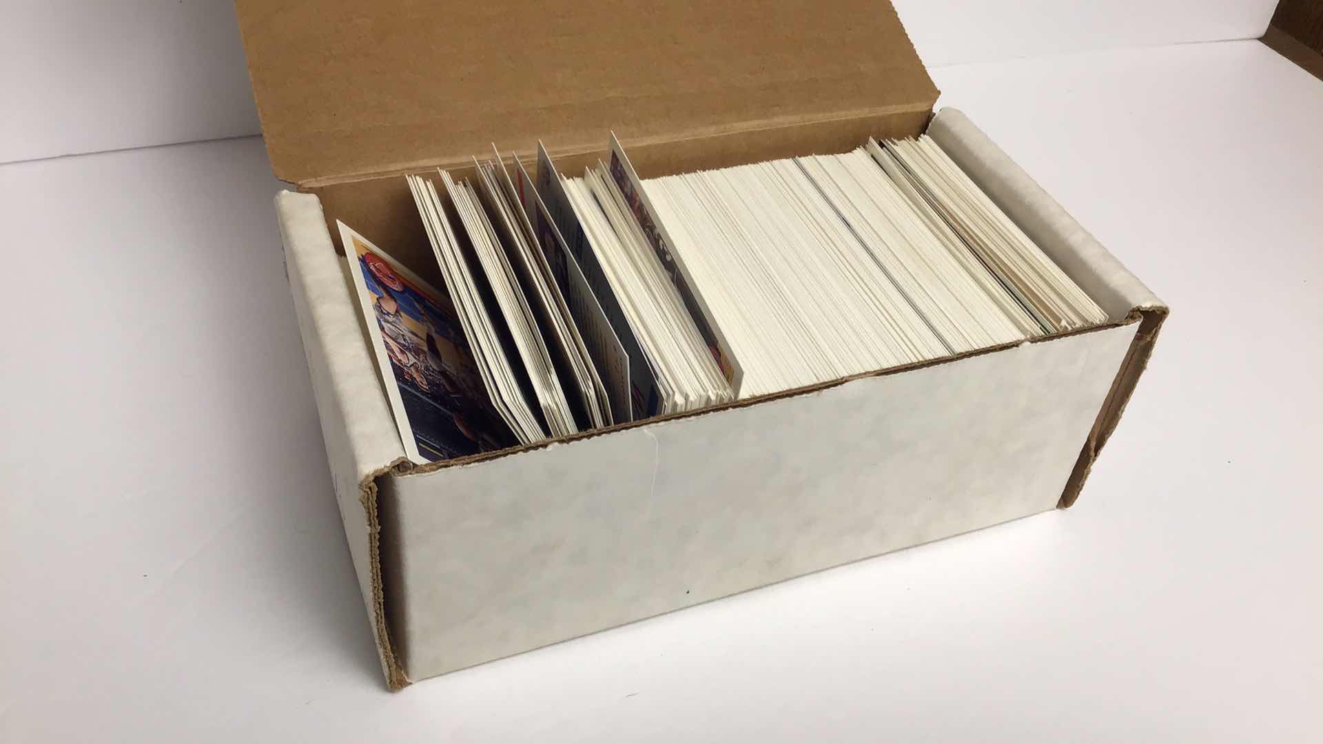 Photo 1 of $100 LOT OF APPROX 400 NFL & NBA 1990S TRADING CARDS (TOPPS, FLEER, UPPER DECKS, NBA HOOPS)*