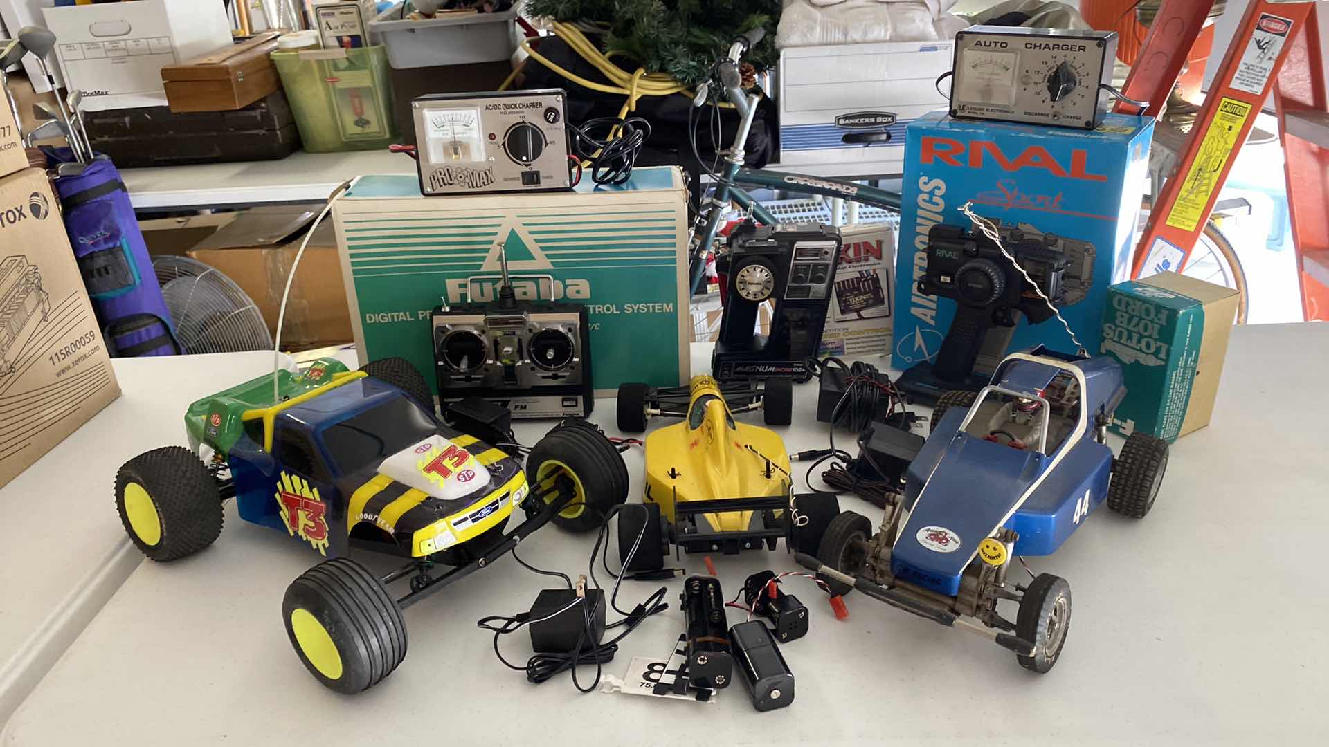 Photo 2 of 3-REMOTE CONTROL CARS, ASSORTED CONTROLLERS AND ACCESSORIES