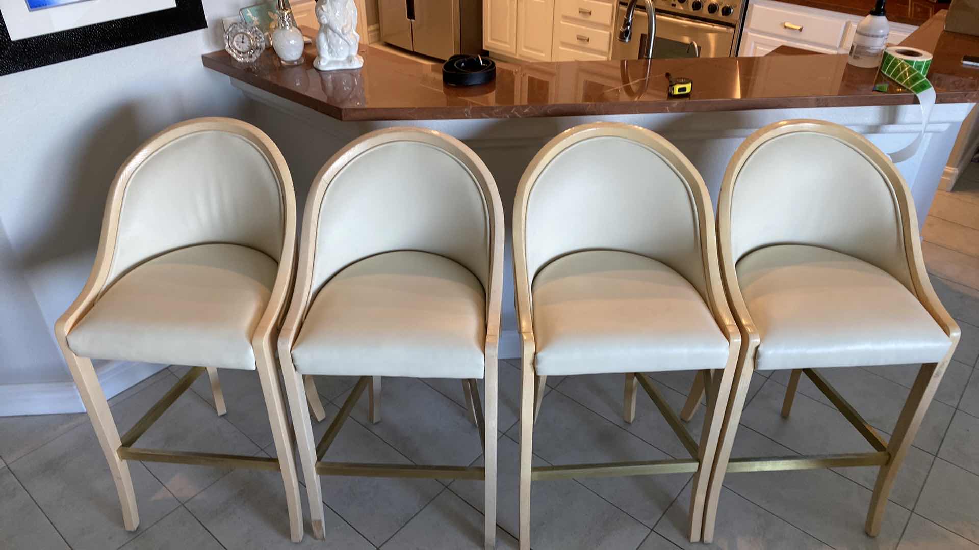 Photo 2 of 4 - CREAM COLOR LEATHER WITH LIGHT WOOD BAR STOOLS FROM THE WYNN - SEAT HEIGHT 31.5”