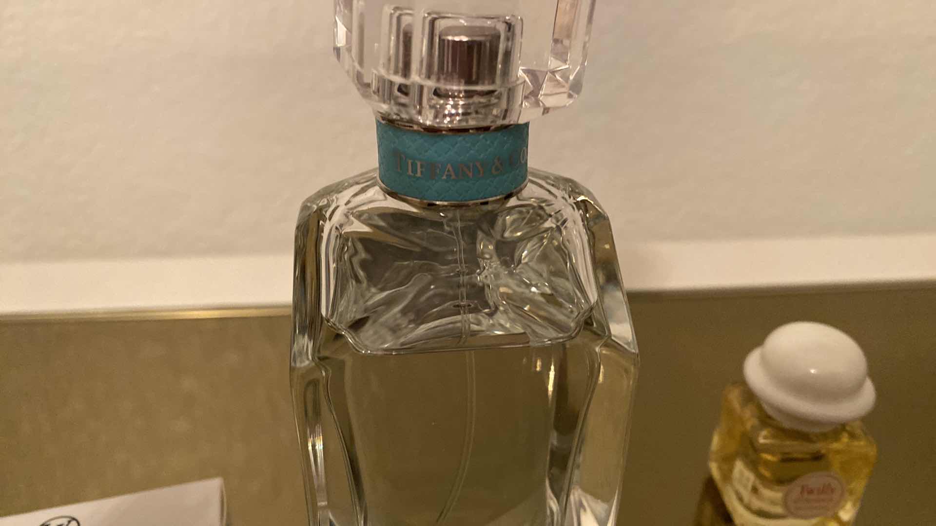 Photo 3 of TIFFANY & CO PERFUME 2.5 FL OZ. 7/8 FULL AND ASSORTED SAMPLES