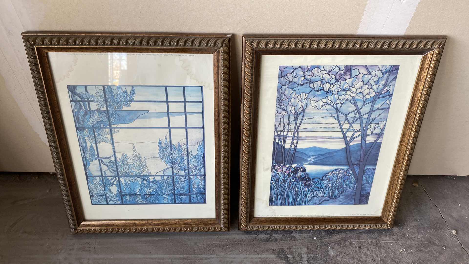 Photo 1 of PAIR OF FRAMED FLORAL ARTWORK 13” x 16 1/2” Note water damage