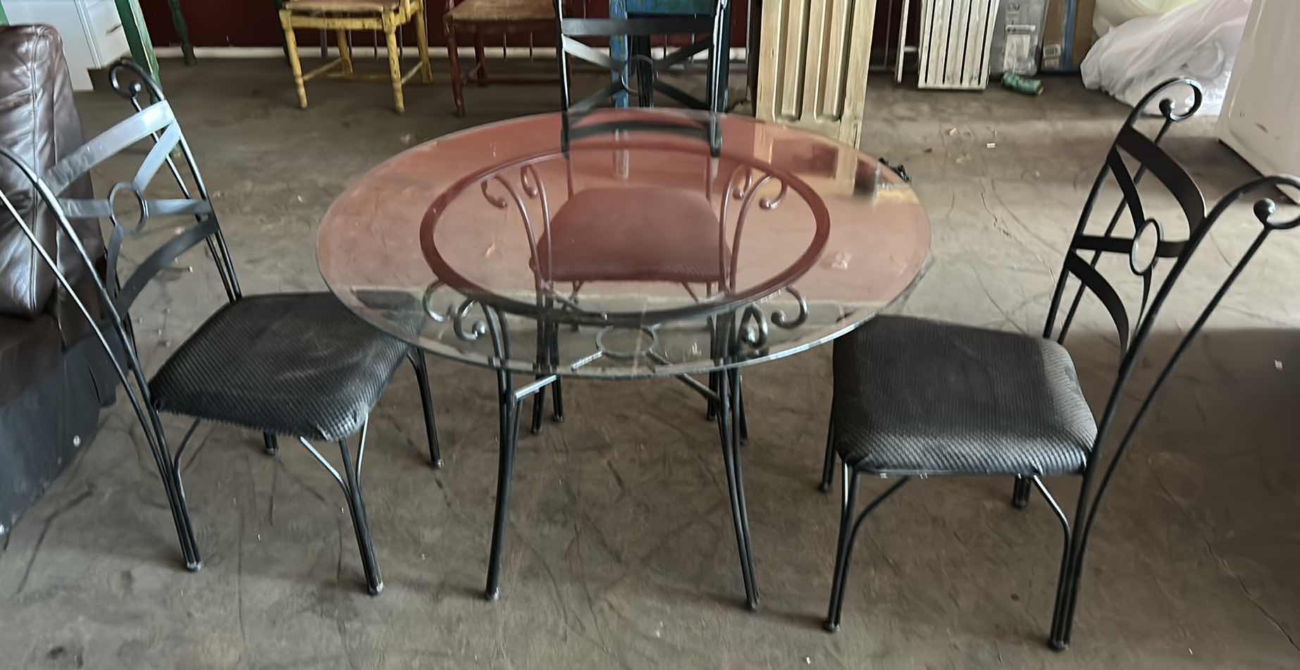 Photo 1 of METAL TABLE WITH GLASS TOP AND 3 CHAIRS 45” x 30”