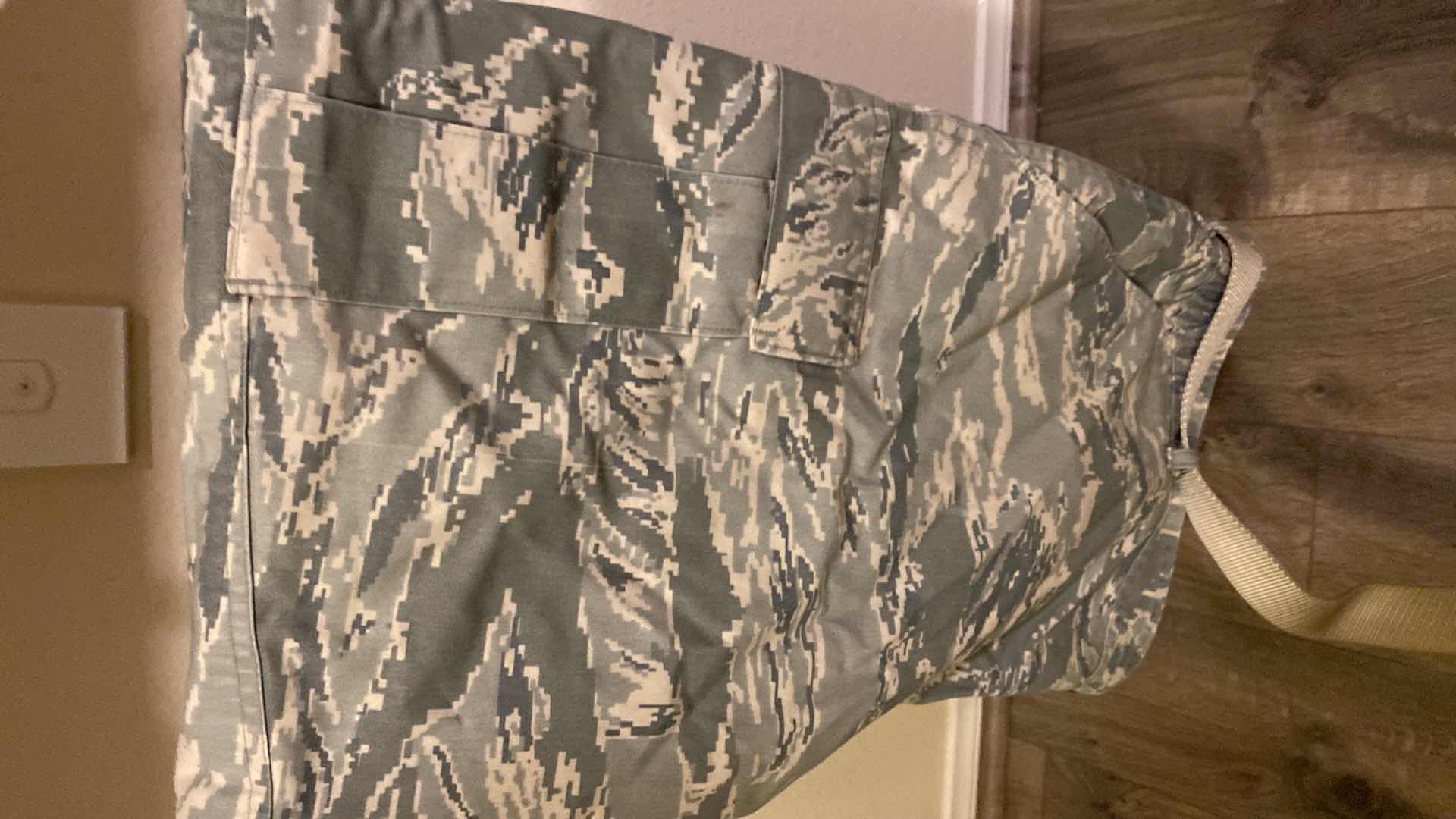 Photo 1 of MENS SIZE APPROX XL CAMO GORTEX JACKET WITH FLEECE LINER AND SIZE 38R CANVAS CARGO PANTS
