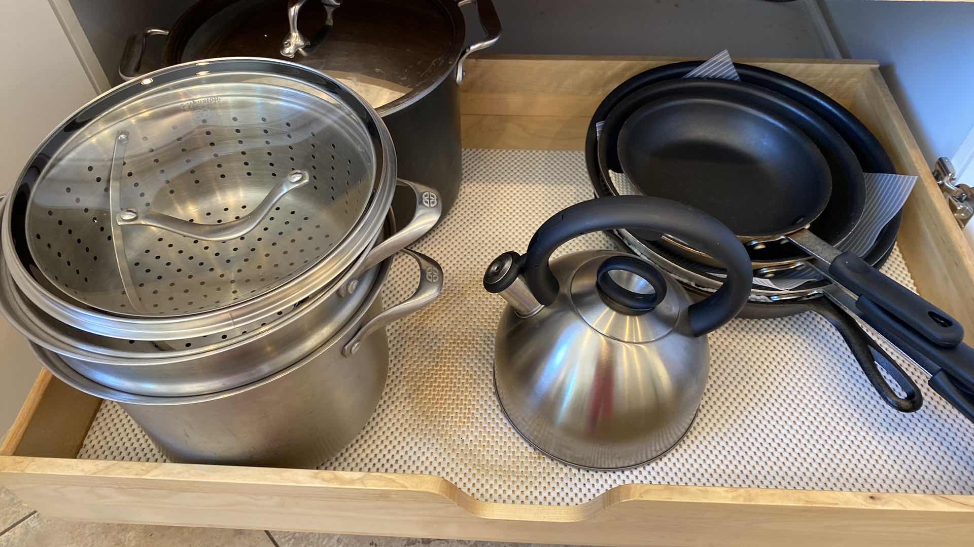 Photo 1 of CONTENTS KITCHEN CABINET SHELF POTS AND PANS