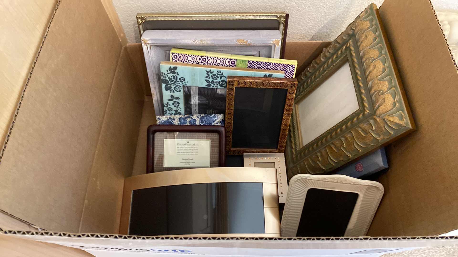 Photo 1 of BOX OF PICTURE FRAMES