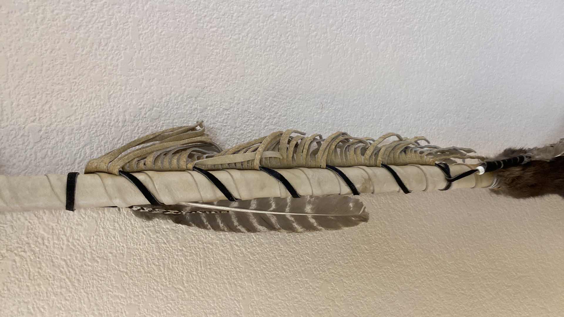 Photo 1 of NATIVE AMERICAN SPEAR WITH FUR AND HIDE 77 1/2”