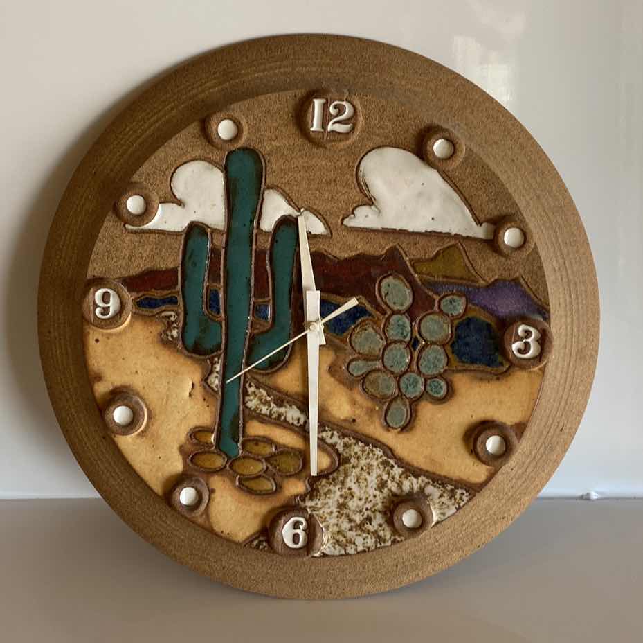 Photo 1 of SOUTHWEST WALL CLOCK SIGNED ON CLAY 13 1/2”