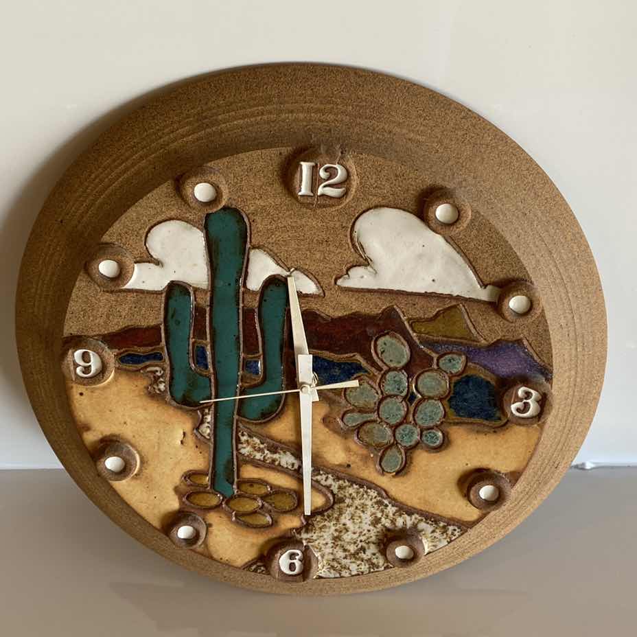 Photo 2 of SOUTHWEST WALL CLOCK SIGNED ON CLAY 13 1/2”