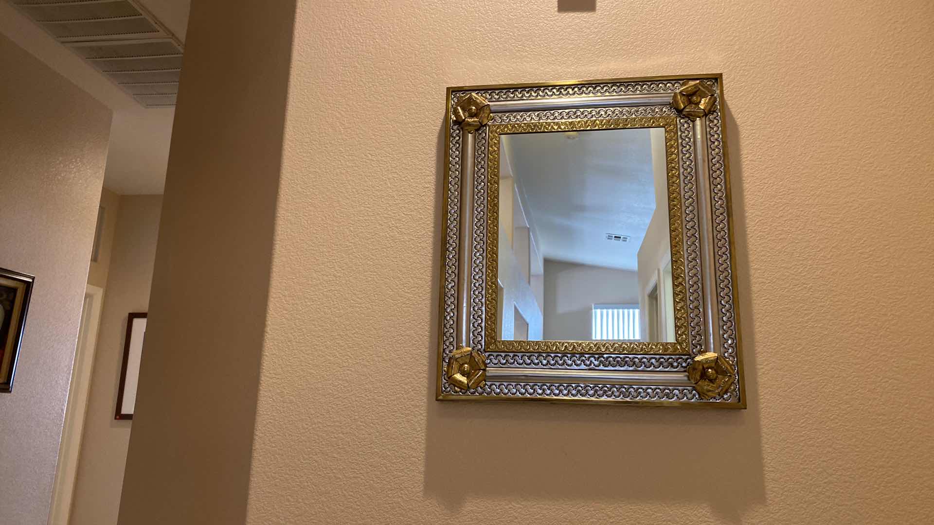 Photo 2 of UNIQUE METAL FRAMED MIRROR 24” x 27 1/2”