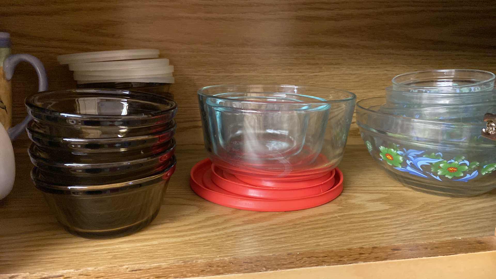Photo 2 of CONTENTS OF KITCHEN CABINET PYREX MEASURING CUPS AND MORE