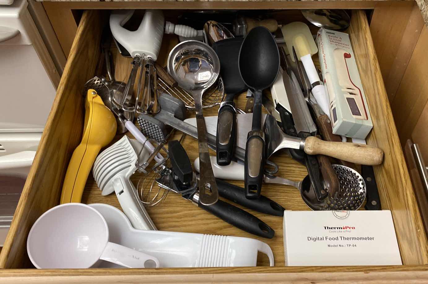 Photo 1 of CONTENTS OF KITCHEN CABINET COOKING UTENSILS