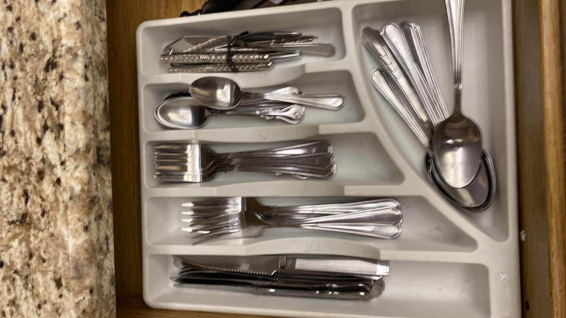 Photo 2 of CONTENTS OF KITCHEN CABINET SILVERWARE AND COOKING UTENSILS