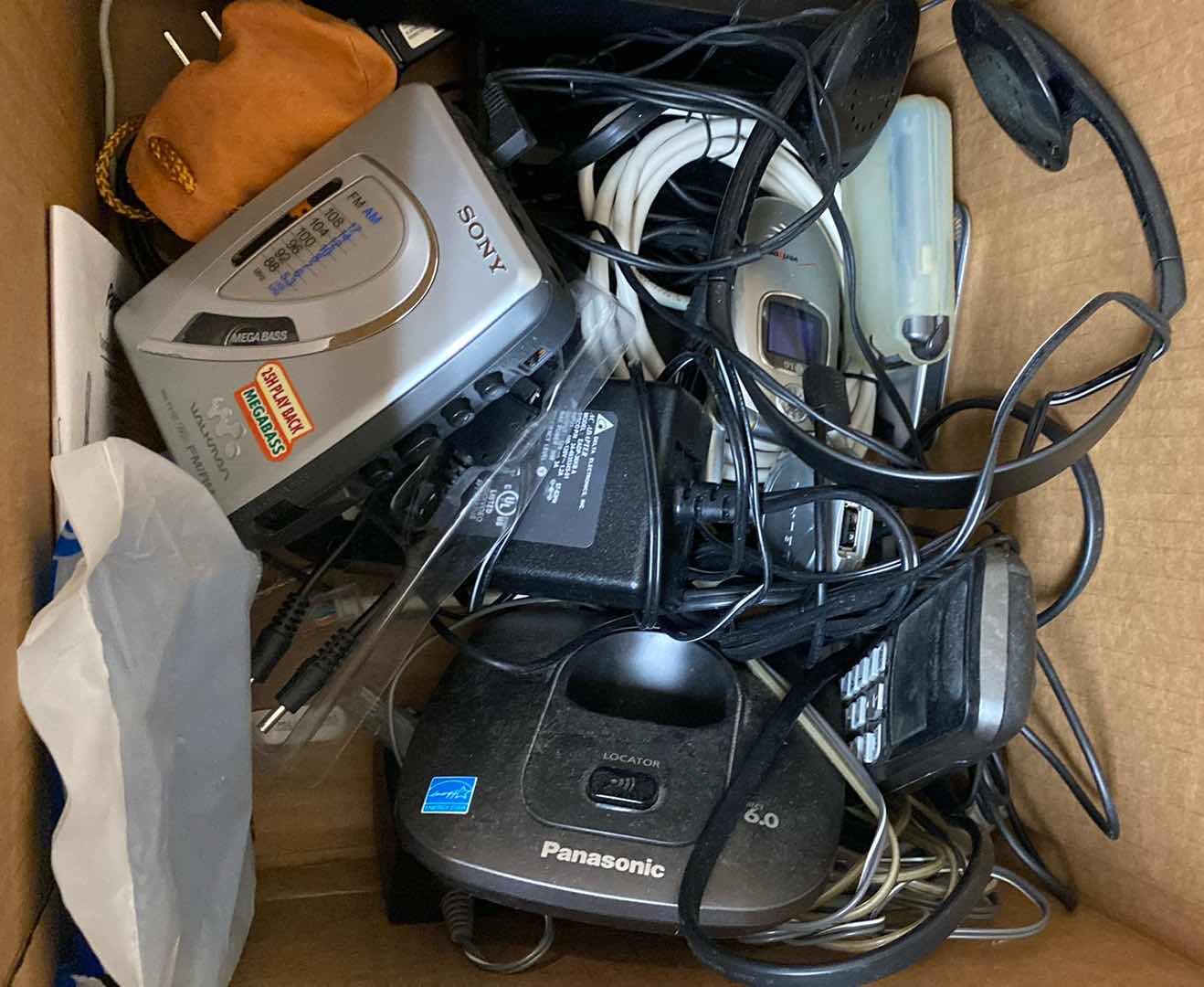 Photo 1 of BOX OF OLD PHONES WALKMAN AND MORE