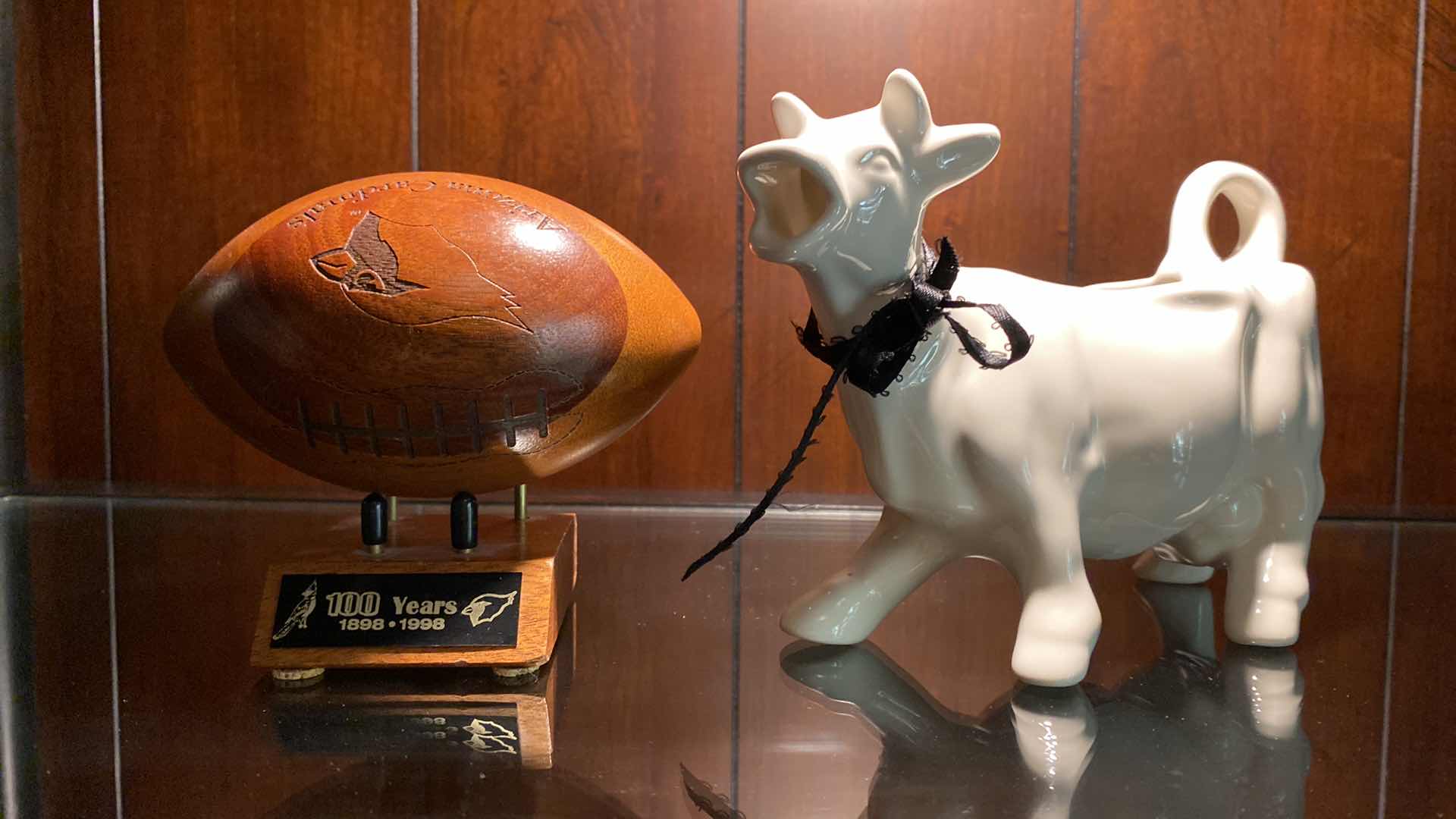 Photo 1 of CERAMIC COW AND AZ CARDINALS FOOTBALL SOUVENIR