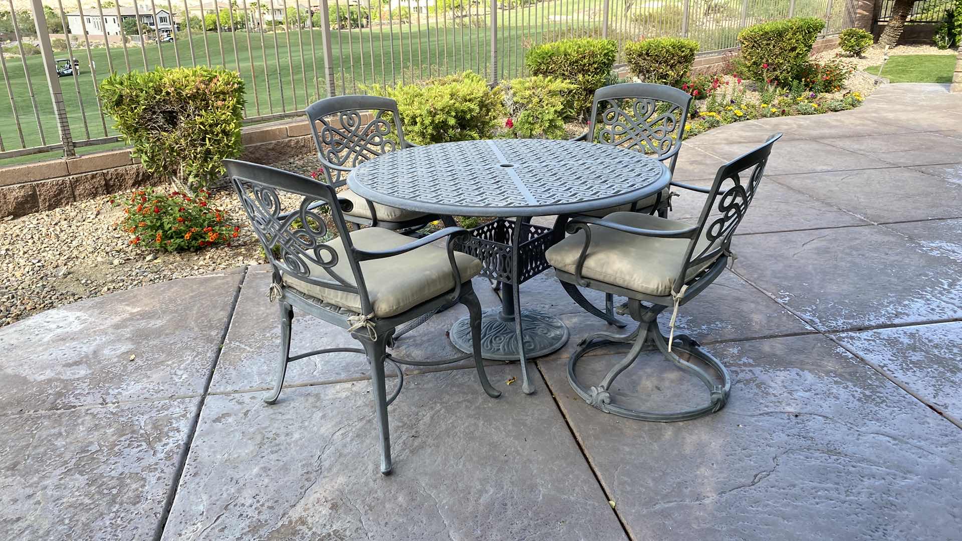Photo 1 of ALUMINUM 5 PIECE PATIO SET TABLE 48” x 29” AND 4 CHAIRS WITH CUSHIONS