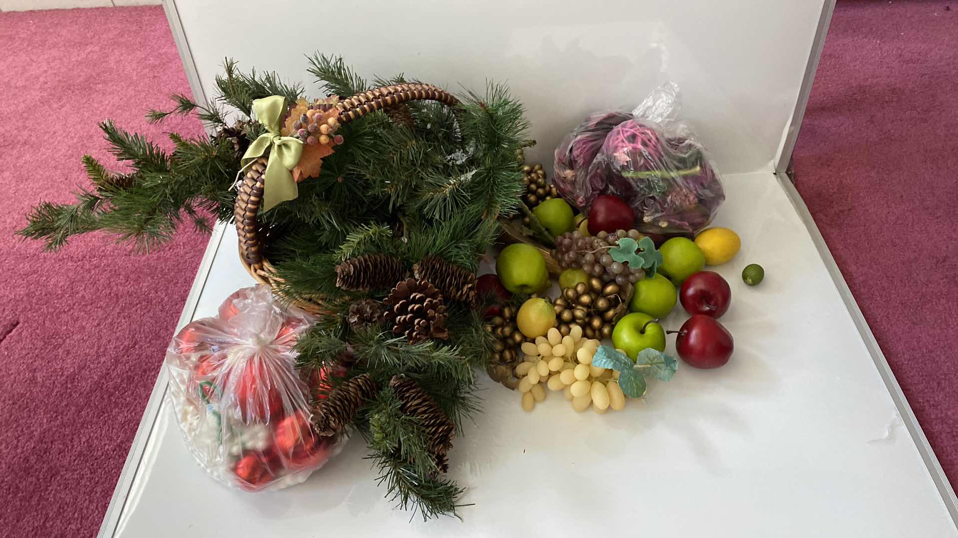 Photo 2 of FAUX FRUIT AND BASKET WITH PINE BRANCHES AND RED HOLIDAY BALLS