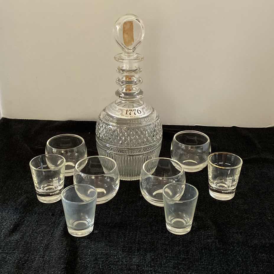 Photo 1 of SEAGRAMS DECANTER WITH ASSORTED SHOT GLASSES