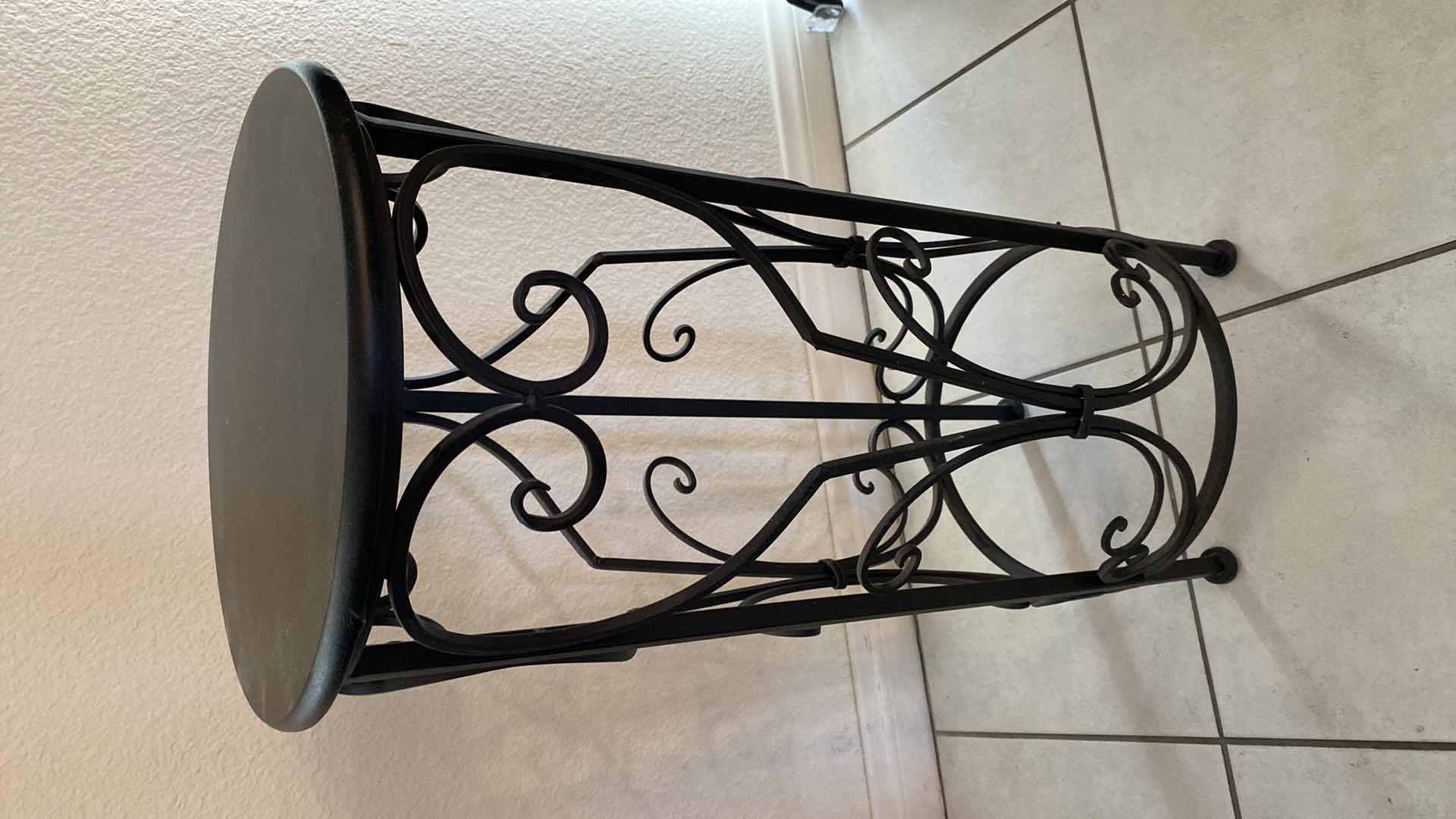 Photo 1 of BLACK ALUMINUM PLANT STAND 
11 1/2” x 26”