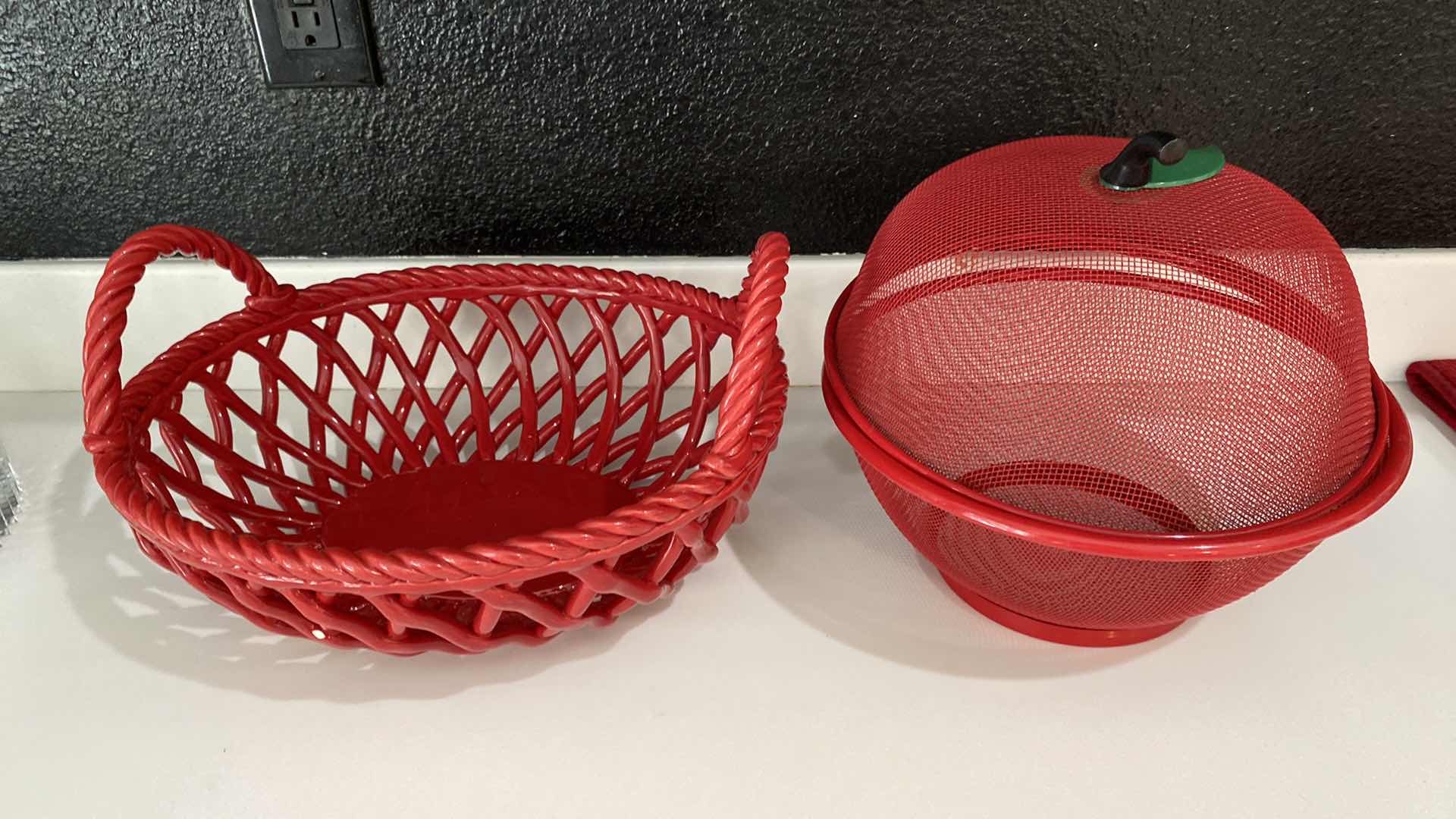 Photo 1 of CONTENTS OF KITCHEN CABINET SHELF - RED CERAMIC BASKET AND MESH BOWL