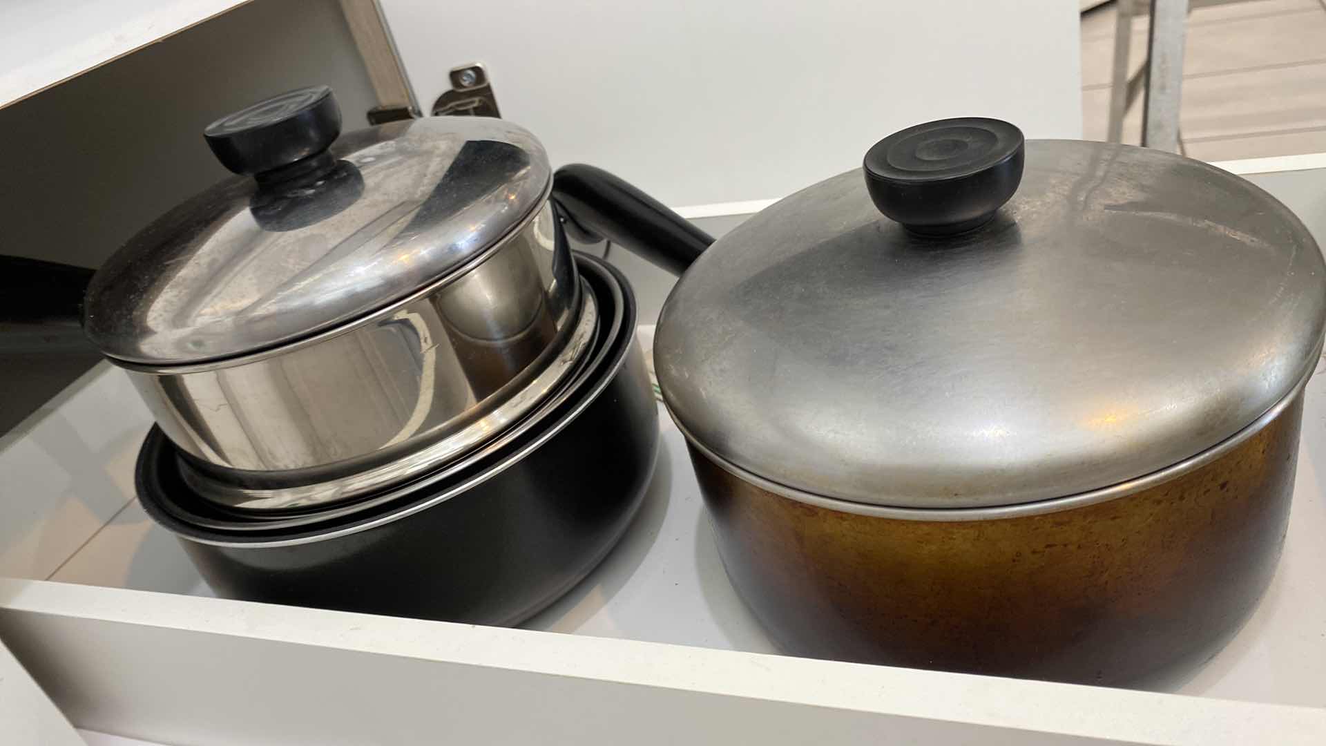 Photo 2 of CONTENTS OF KITCHEN CABINET - PANS WITH LIDS