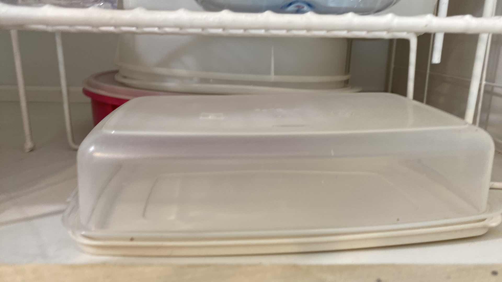 Photo 5 of CONTENTS OF KITCHEN CABINET ABOVE FRIDGE - PLASTIC PITCHERS STORAGE AND SHELVING