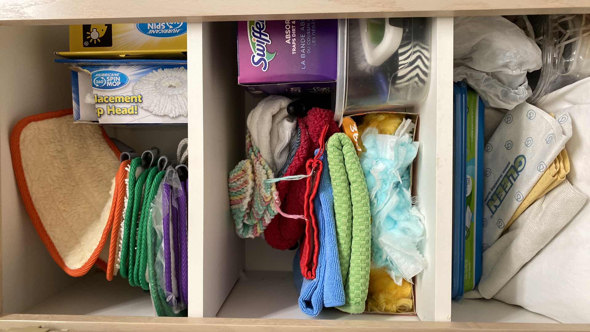 Photo 2 of CONTENTS LAUNDRY ROOM CABINET - CLEANING TOWELS CANDLES