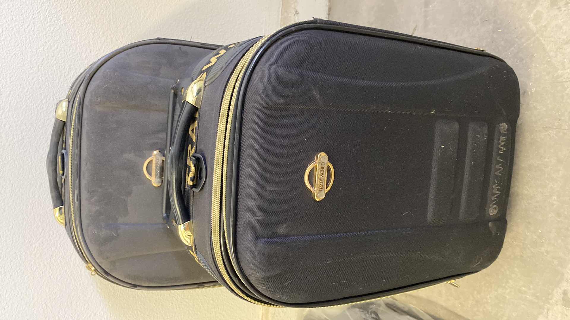 Photo 1 of PAIR OF SUITCASES