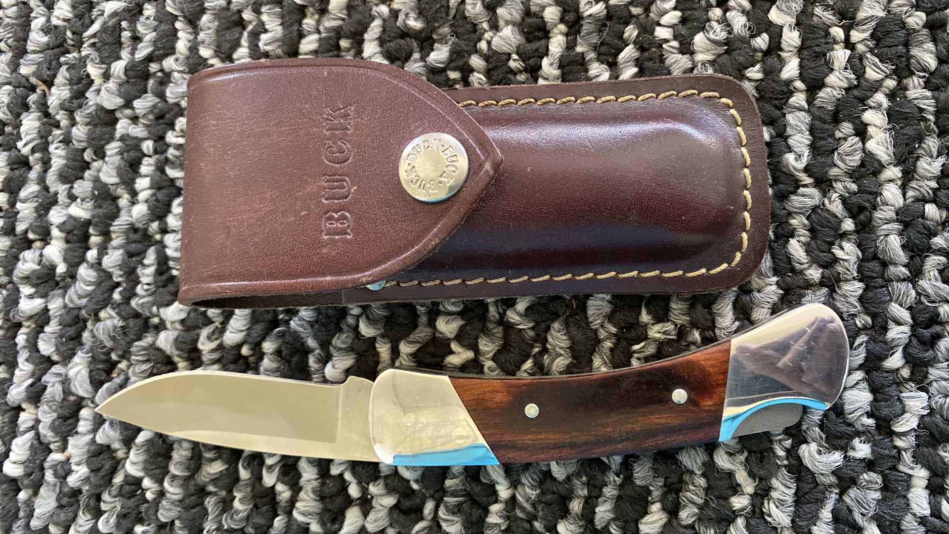 Photo 1 of BUCK KNIFE WITH SHEATH 7 1/2”