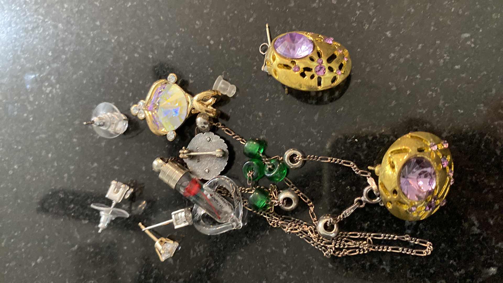 Photo 4 of COSTUME JEWELRY AND OLD CELL PHONES