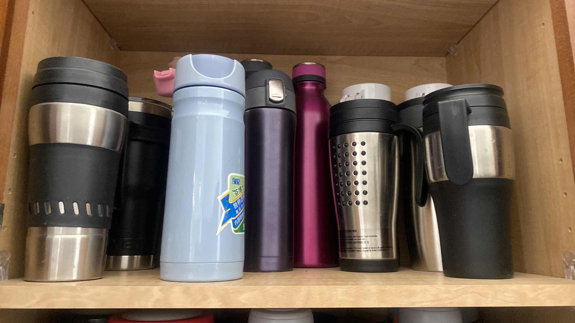 Photo 4 of CONTENTS KITCHEN CABINET- TEA CUPS & INSULATED CUPS