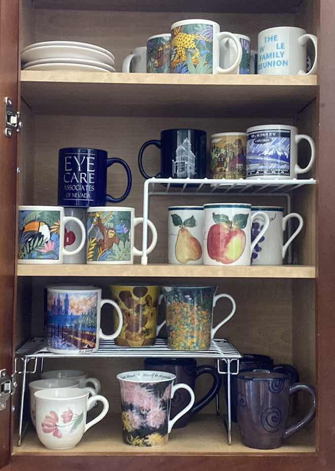 Photo 1 of CONTENTS KITCHEN CABINET- COFFEE CUPS