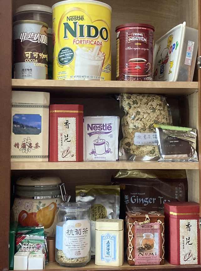 Photo 1 of CONTENTS KITCHEN CABINET- TEA ASSORTMENT