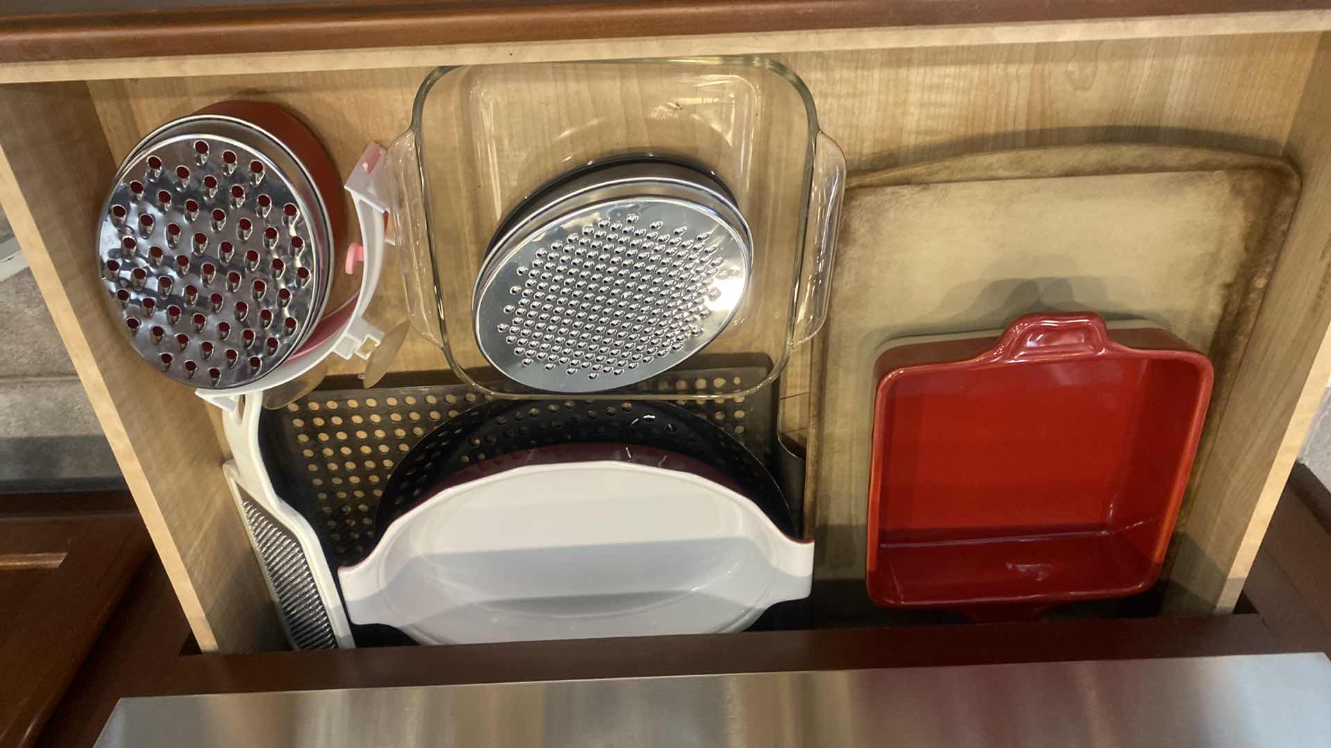 Photo 1 of CONTENTS OF KITCHEN CABINET - BAKEWARE