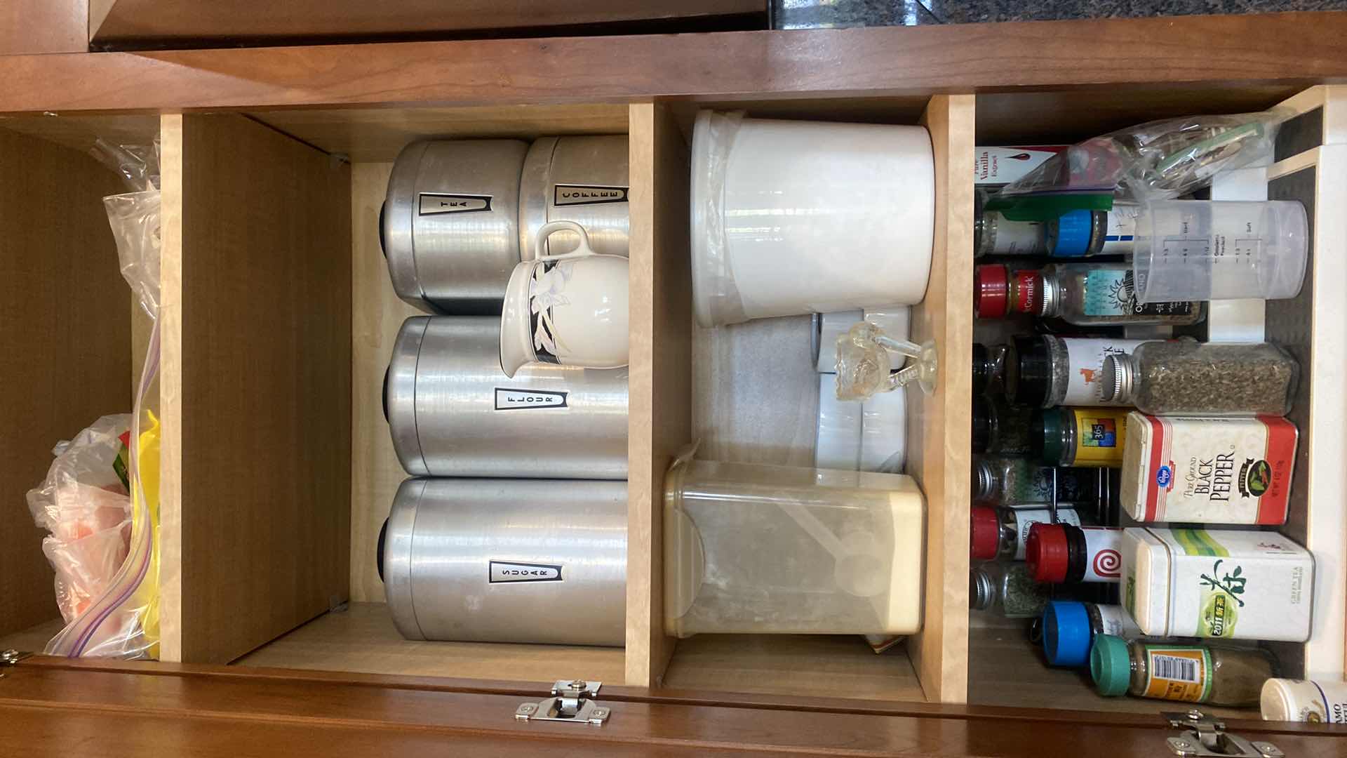 Photo 1 of CONTENTS OF KITCHEN CABINET - SPICES AND CANISTERS