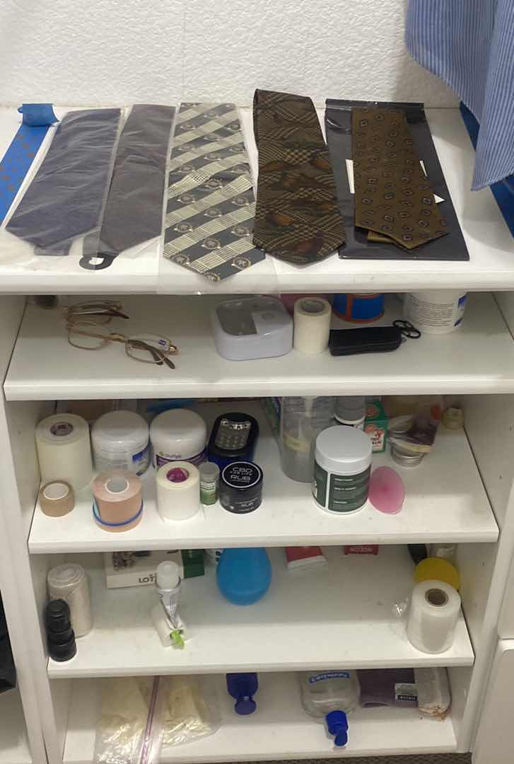 Photo 1 of MENS TIES AND HEALTH CARE SECTION OF CLOSET