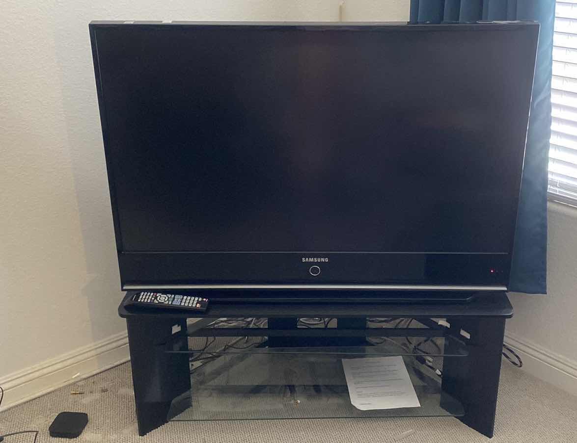 Photo 1 of SAMSUNG 50” TV AND TV STAND