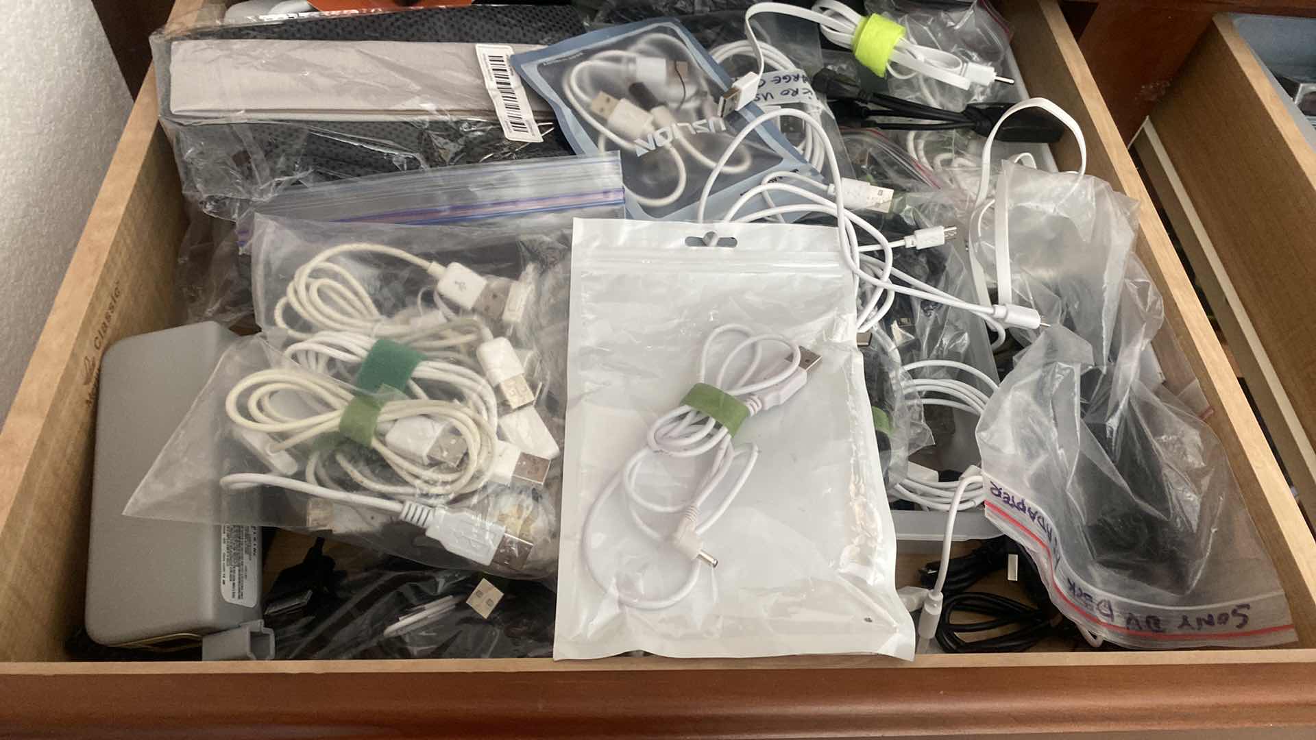 Photo 1 of CONTENTS OF DRAWER IN OFFICE - CORDS